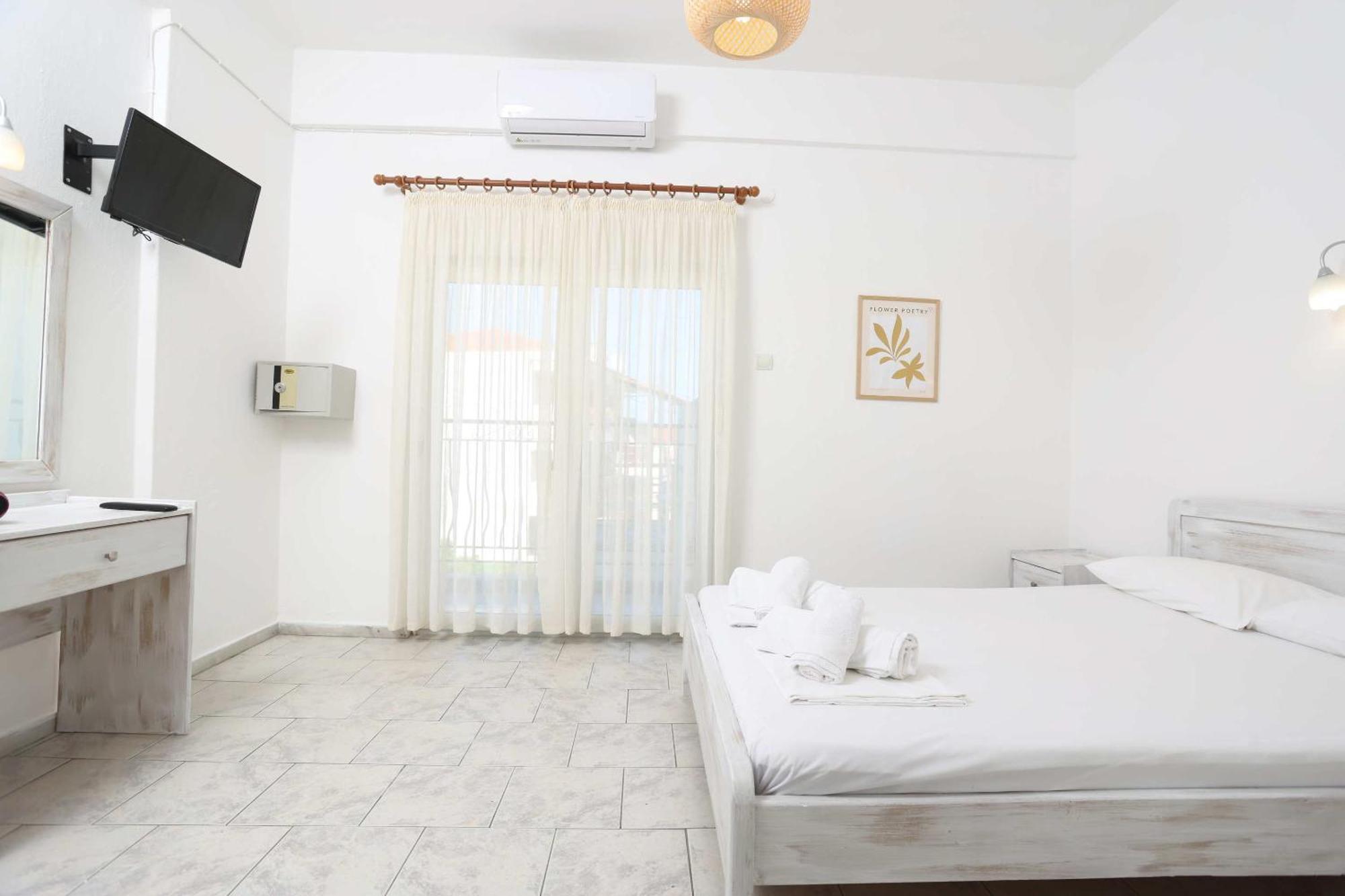 פוליכרונו Spanos Apartments Anna'S Lodge מראה חיצוני תמונה